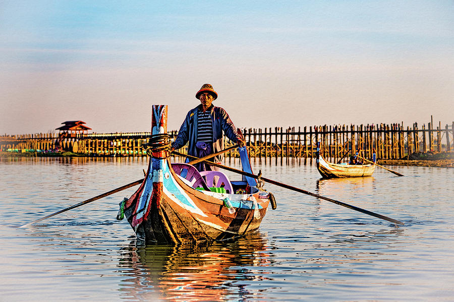 Boatman On Taung Tha Man Lake Photograph by Chris Lord