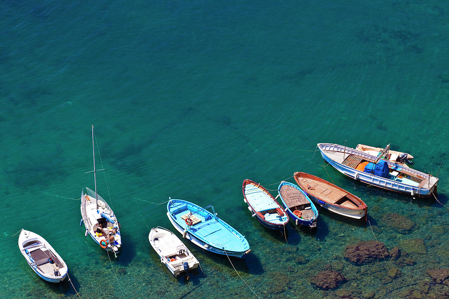 Boats Anchored At Marina Corricella Photograph by Richard Ianson