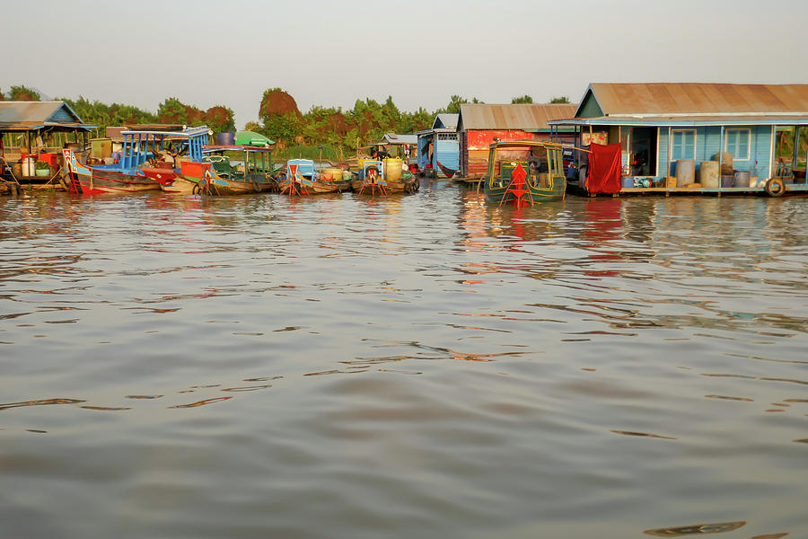 Boats and houses in floating fishing village of Tonle Sap River  Photograph by Karen Foley