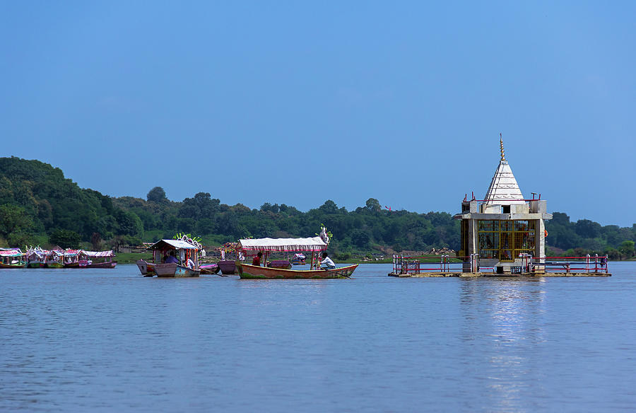 Boats and Temple on the Narmada River, India Photograph by Amy Sorvillo