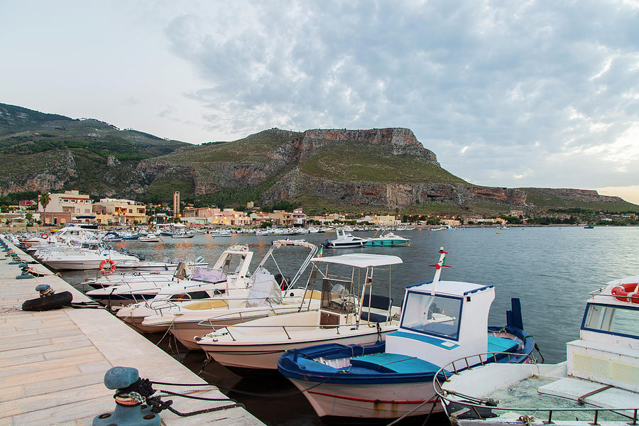 Boats In The Evening Light In Front Of Tonnara Di Bonagia In Sicily, Italy Photograph by Nicola Lederer