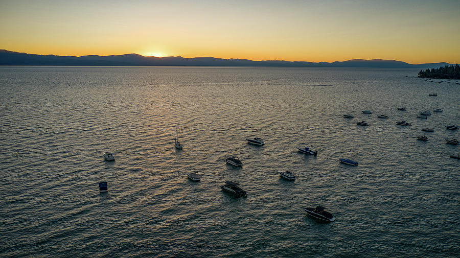 Boats In The Sunset Lake Tahoe  Photograph by Anthony Giammarino