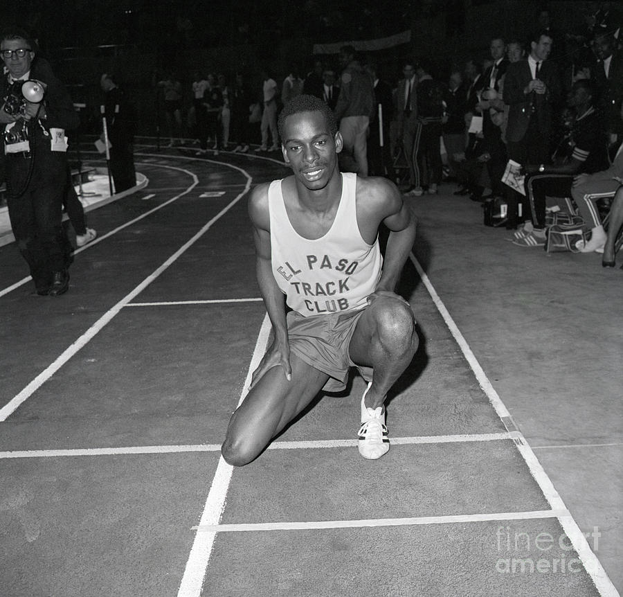 Bob Beamon Kneeling On Track Photograph by Bettmann