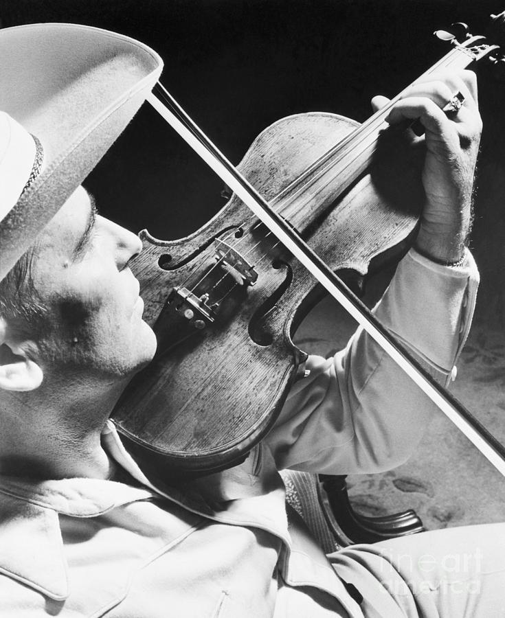 Bob Wills Playing Fiddle Photograph by Bettmann
