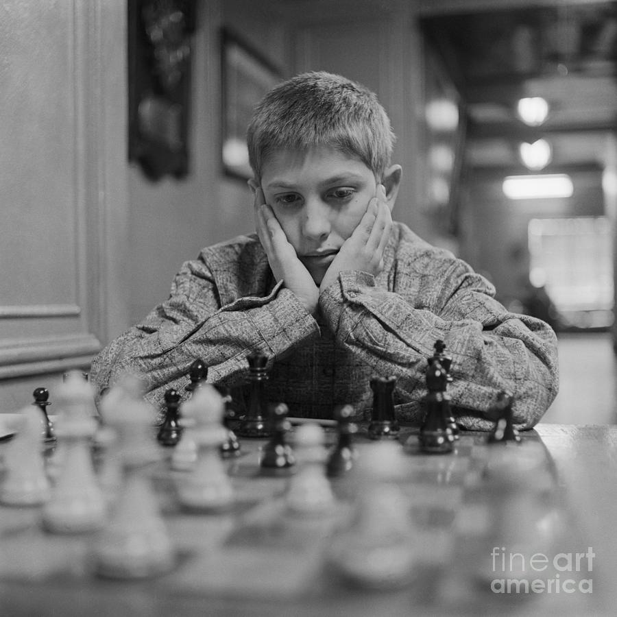 Bobby Fischer at Chess Board with Newspaper Bobby the Champ