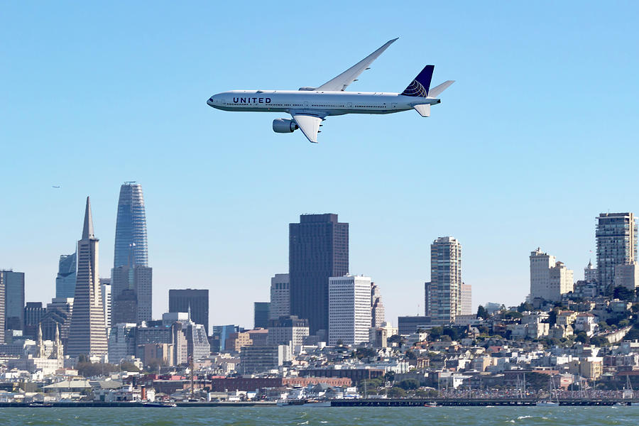 Boeing 777 and SF Skyline Photograph by Rick Pisio