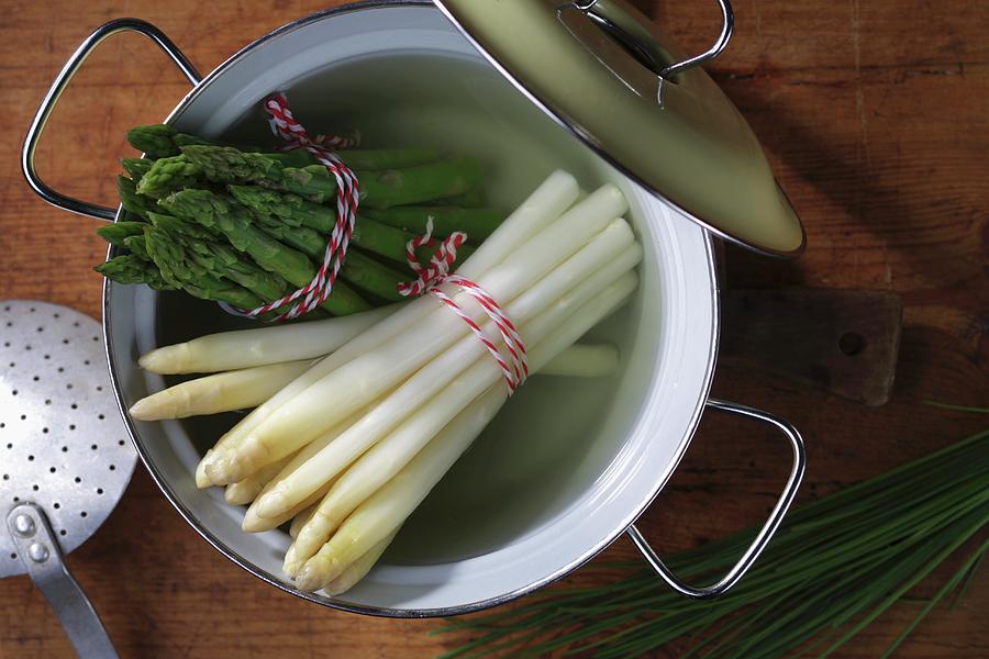 Boiled White And Green Asparagus In A Pot Photograph by Frank Weymann