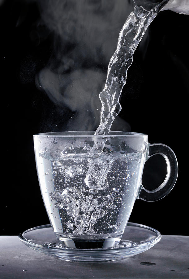 Boiling Water Being Poured Into A Glass Cup Photograph by Petr Gross ...