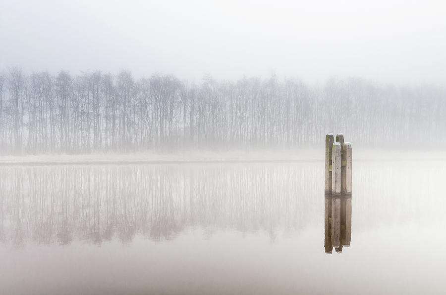 Bollard in the fog Photograph by Jenco Van Zalk