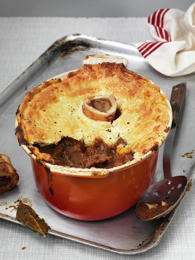 Bone Marrow Pie In An Oven Dish, With A Piece Missing england Photograph by Hugh Johnson
