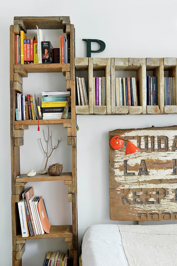 Bookcase Made From Reclaimed Wood Framing Bed Headboard Photograph by Henri Del Olmo