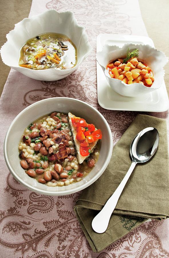 Borlotti Bean And Pearl Barley Soup, Chickpea Soup With Pasta, And Mushroom Soup With Spring Onions Photograph by Sjoberg, Marie