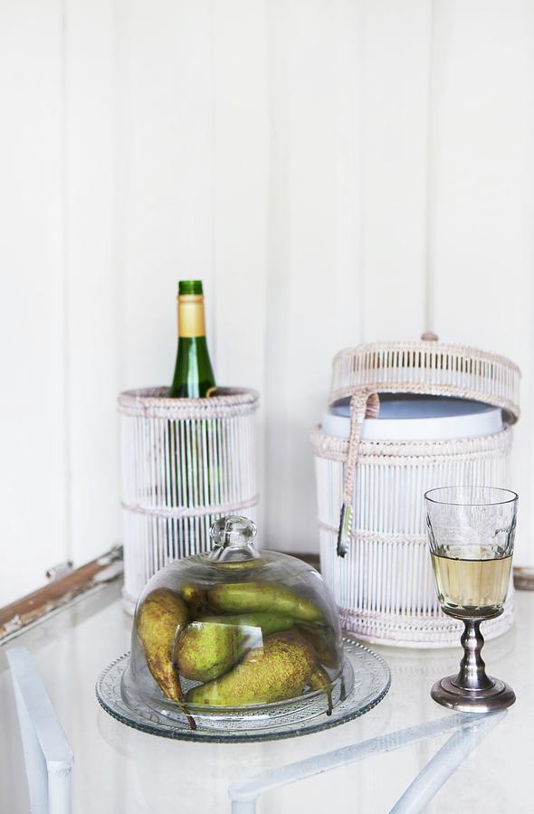 Bottle In Hand-crafted Container Laced With Cord And Pears Under Glass Bell Jar Photograph by Annette Nordstrom