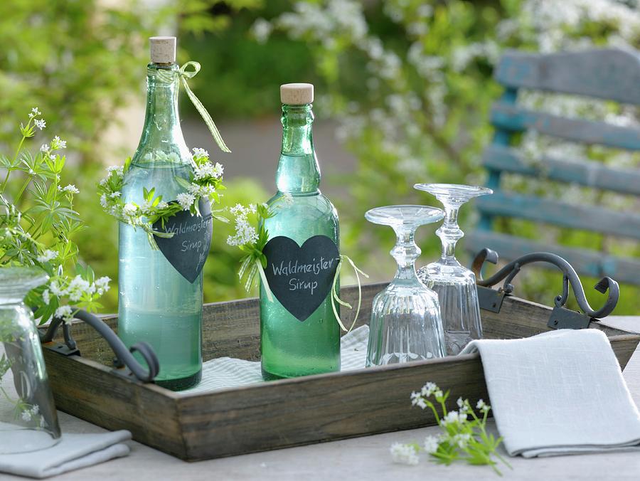 Bottles Of Homemade Woodruff Syrup As A Gift Decorated With Hearts And Wreaths Photograph by Friedrich Strauss