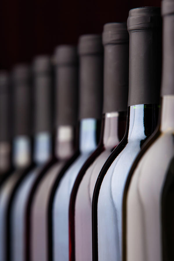 Bottles Of Wine In A Row Photograph by Halbergman