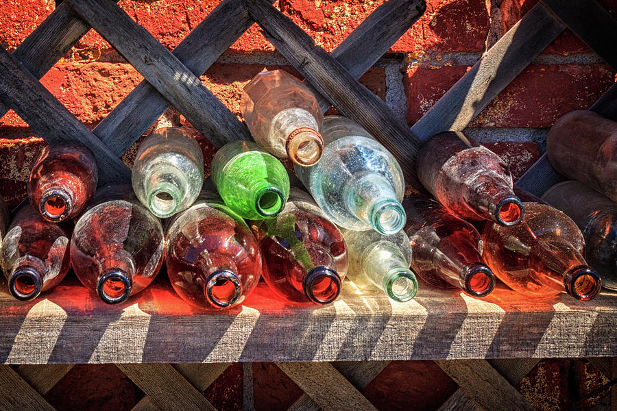 Bottles On A Shelf Photograph by James Eddy