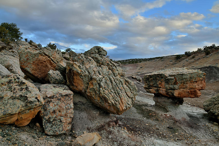 Boulders in BLM Bentonite Site at Sunset Photograph by Ray Mathis
