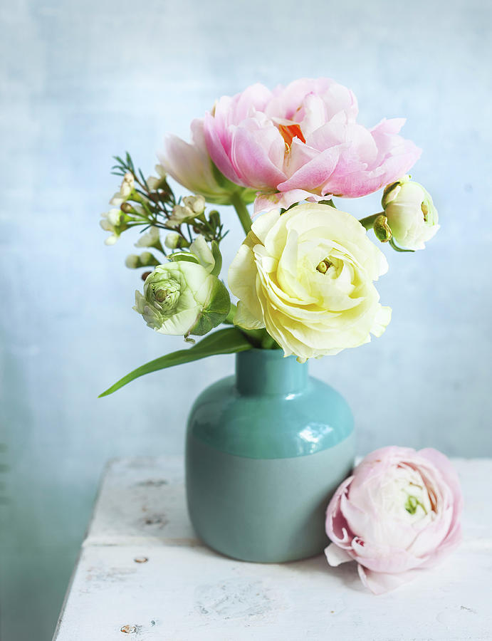 Bouquet Of Ranunculus In Blue Vase Photograph by Ira Leoni