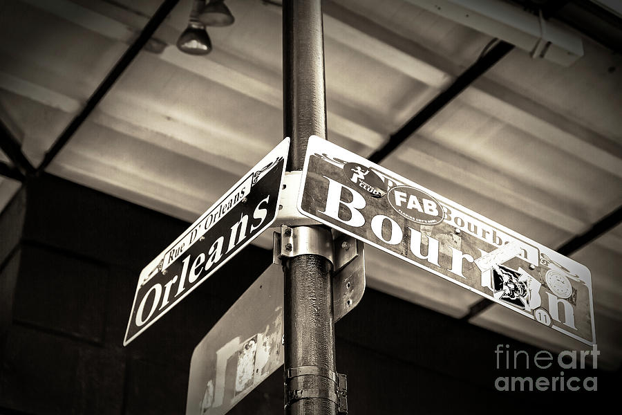 Bourbon and Orleans Street Sign in New Orleans Photograph by John Rizzuto