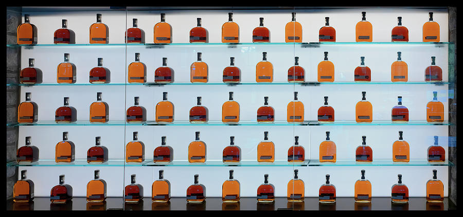 Bourbon Bottles Photograph by Susan Rissi Tregoning