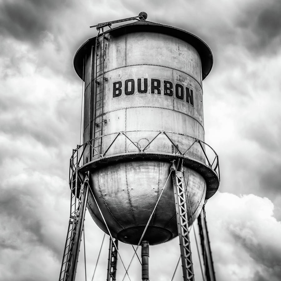 Bourbon Monochrome Whiskey Water Tower Barrel and Cloudy Skies Photograph by Gregory Ballos