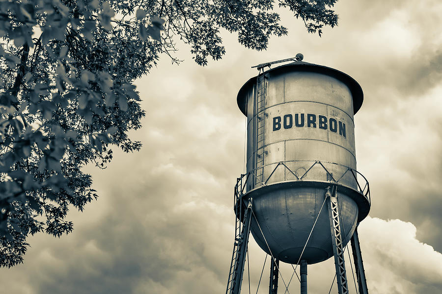 Bourbon Whiskey Water Tower and Clouds - Sepia Edition Photograph by Gregory Ballos
