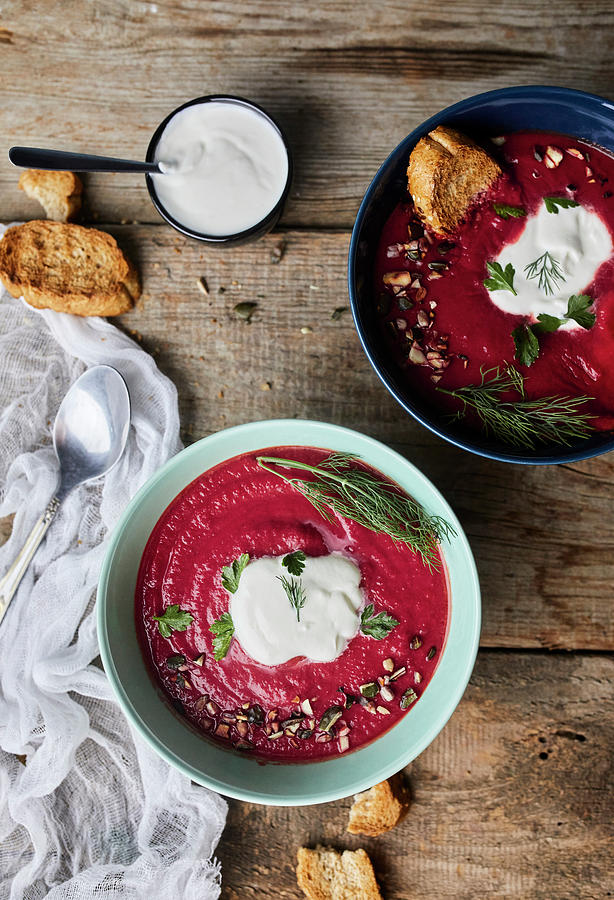 Bowl Of Beetroot Soup With Coconut Milk And Sour Cream, Garnished With Parsley And Dill Photograph by Natasa Dangubic