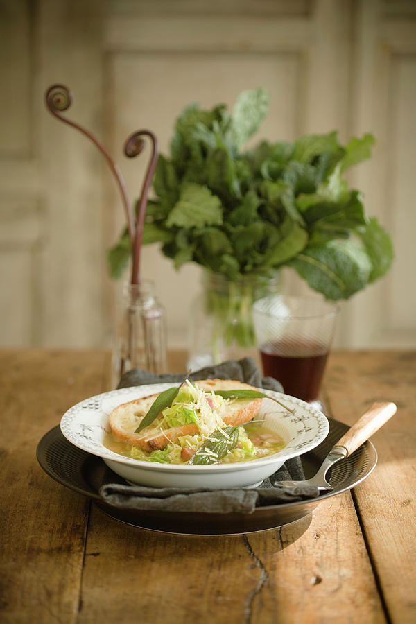 Bowl Of Cabbage Soup On Table Photograph by Colin Cooke
