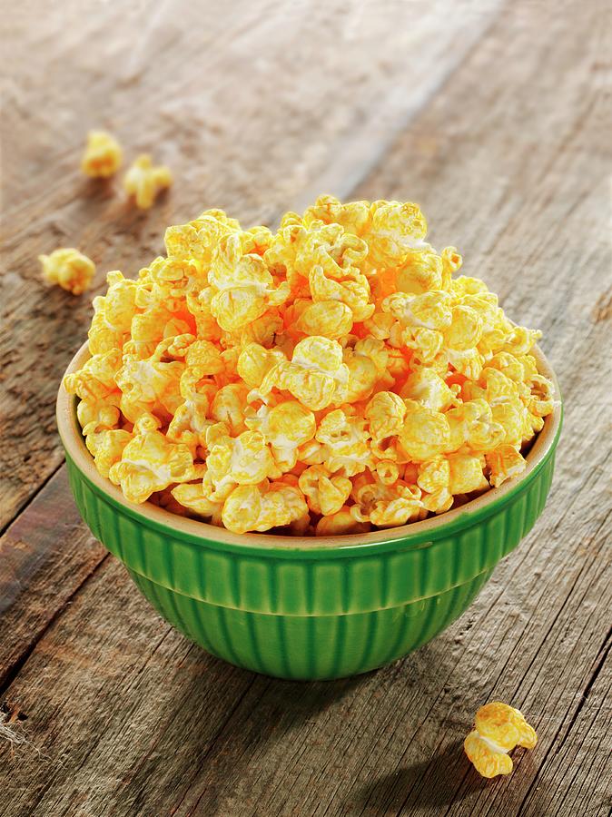 Bowl Of Cheese Flavored Popcorn Photograph by Albert P Macdonald