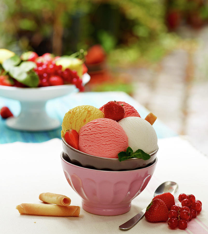 Bowl Of Different Flavored Scoops Of Ice Cream And Fresh Fruit Photograph by Aubergine Studio