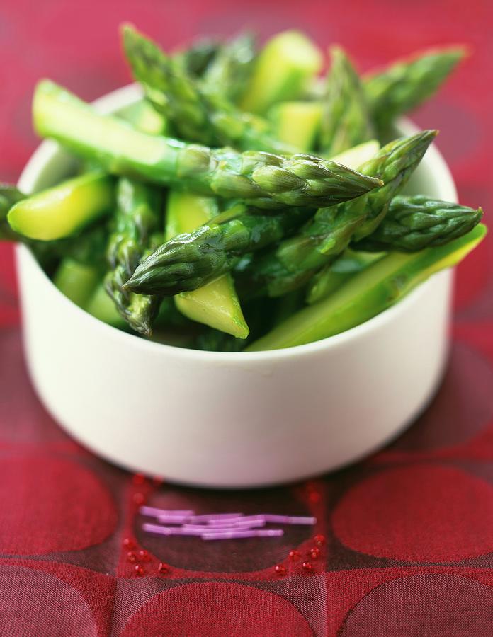 Bowl Of Green Asparagus Tops Photograph by Roulier-turiot