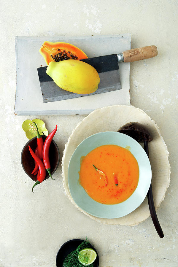 Bowl Of Papaya And Coconut Ginger Thai Cream Soup Photograph by Jalag / Gtz Wrage