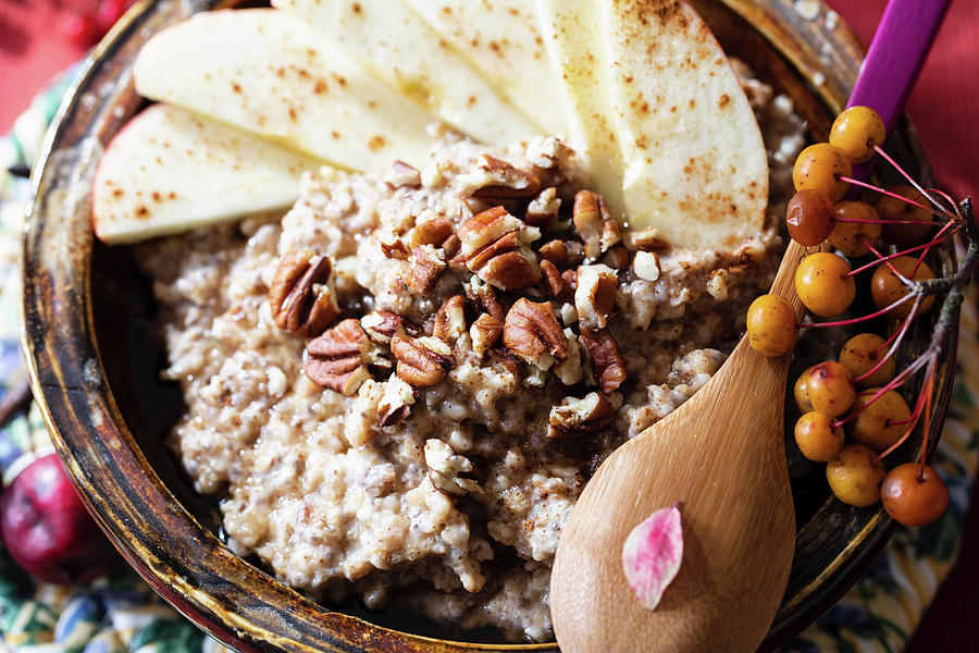 Bowl Of Porridge With Amaranth, Steel Cut Oats, Apples, Pecunt Nuts, Chia Seeds, Flax Seeds, Cinnamon, Almond Mink Photograph by Yelena Strokin