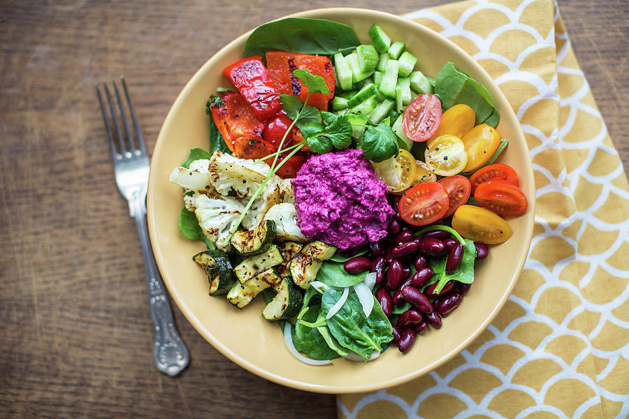 Bowl Of Salad With Oven Roasted Vegtables, Beans And Beetroot Hummus Photograph by Lara Jane Thorpe