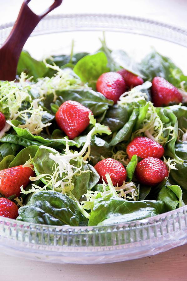 Bowl Of Spinach Salad With Strawberries Photograph by Nele Siebel