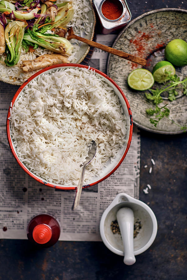 Bowl With Rice On A Table With Asian Food Photograph by Angelika Grossmann