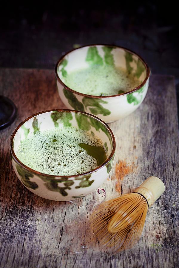 Bowls Of Matcha Tea With A Bamboo Whisk Photograph by Susan Brooks-dammann