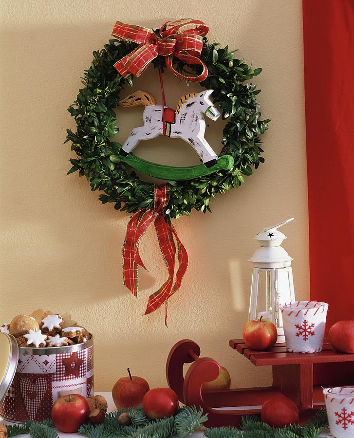 Box Wreath With Small Wooden Rocking Horse Photograph by Strauss, Friedrich
