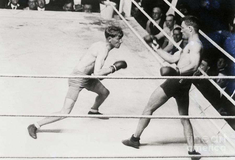 Boxer Backing Opponent Into Corner Photograph by Bettmann