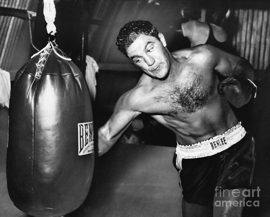 Boxer Rocky Marciano Practices Photograph by Bettmann