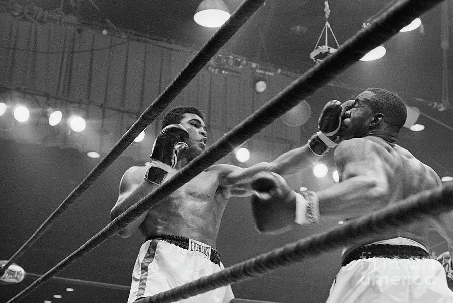 Sports Photograph - Boxers Clay And Liston Fighting by Bettmann