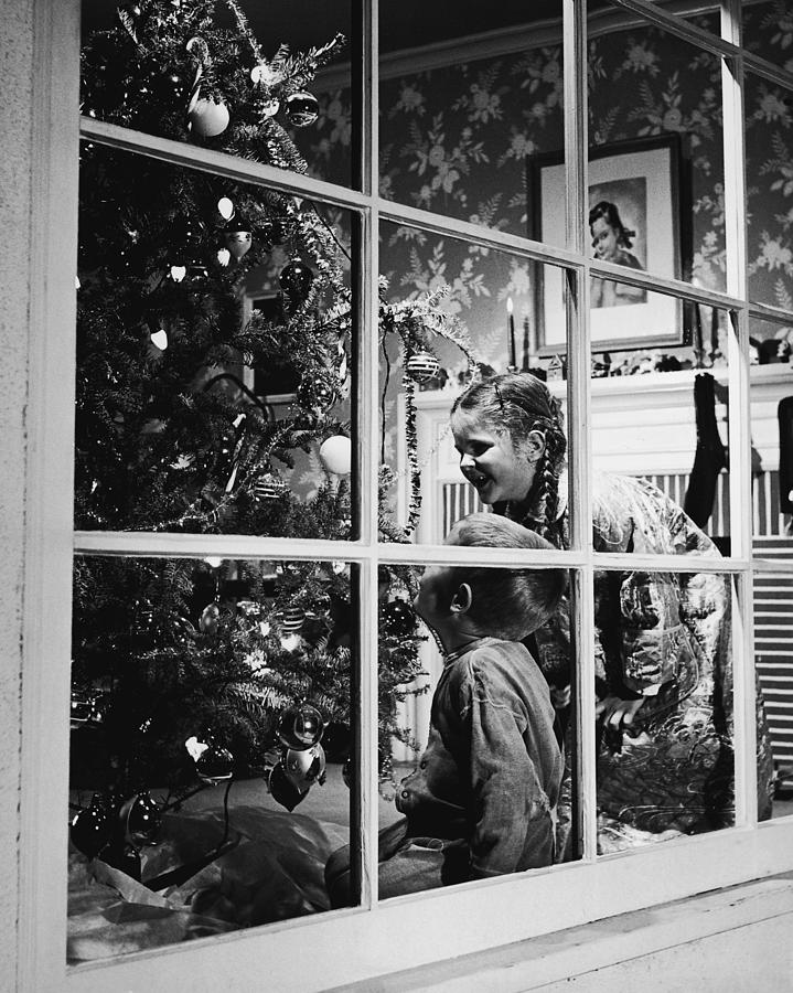Boy And Girl 3-8 Looking At Christmas Photograph by Fpg Boy And Girl 3-8 Looking At Christmas Photograph by Fpg