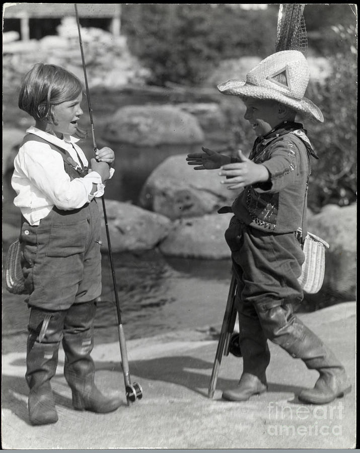 Boy And Girl Dressed In Fly-fishing Gear by Bettmann