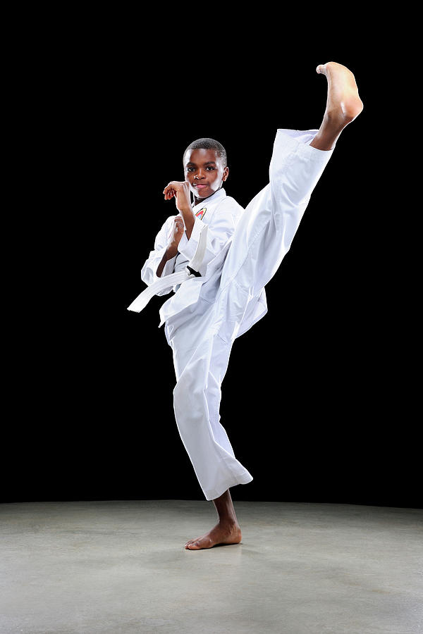Boy Doing A Front Kick Photograph by Chris Stein