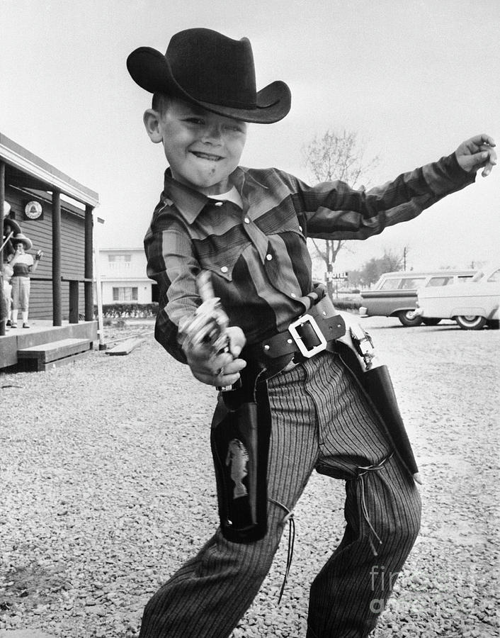 Boy Drawing Toy Pistol Photograph by Bettmann Boy Drawing Toy Pistol Photograph by Bettmann