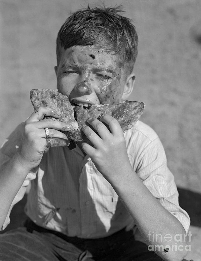 Boy Eating Pie With Both Hands Photograph by Bettmann