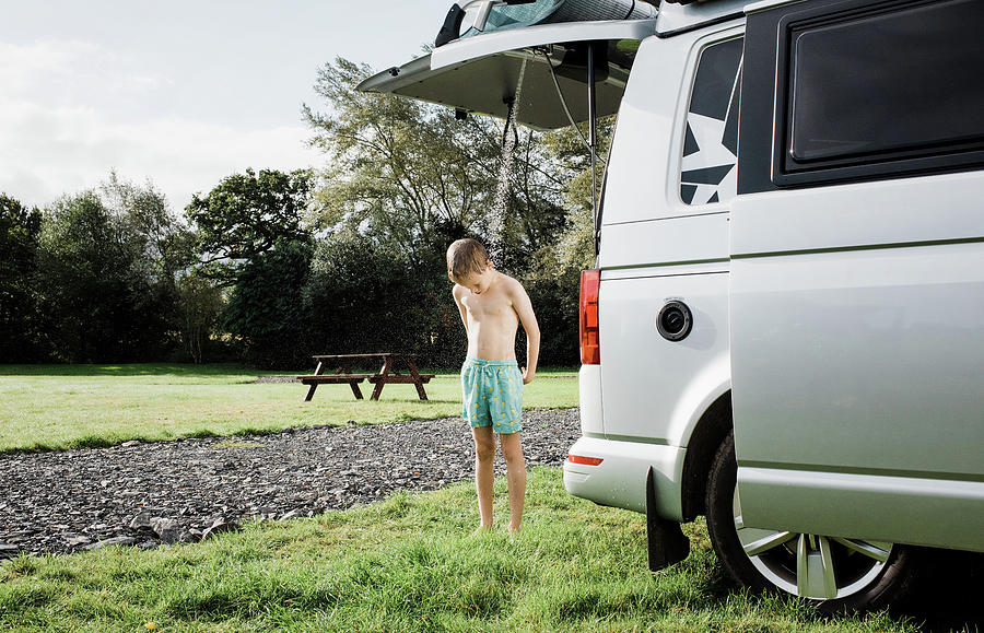 veeg drinken Voorverkoop Boy Enjoying Outdoor Shower Whilst Camping In A Camper Van Photograph by  Cavan Images - Fine Art America