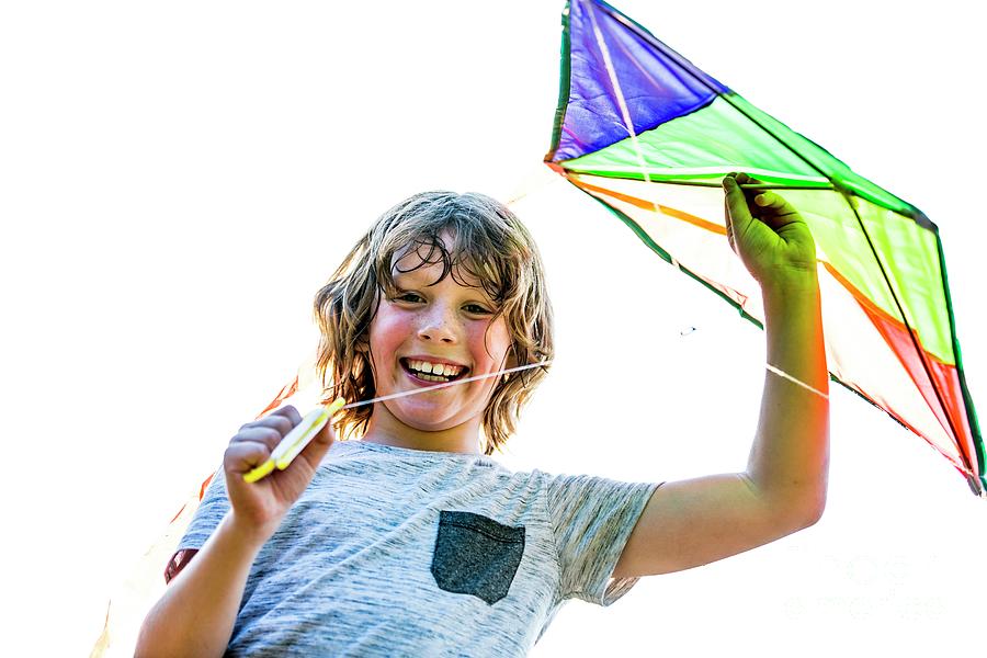 Boy Holding Kite by Science Photo Library