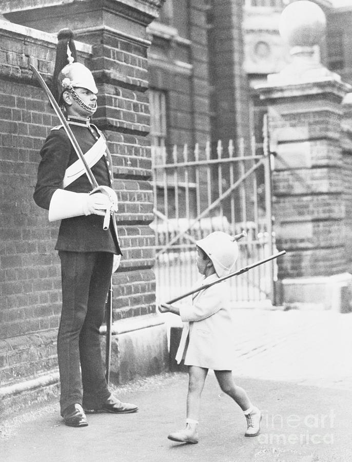 Boy Imitating British Guard by Bettmann
