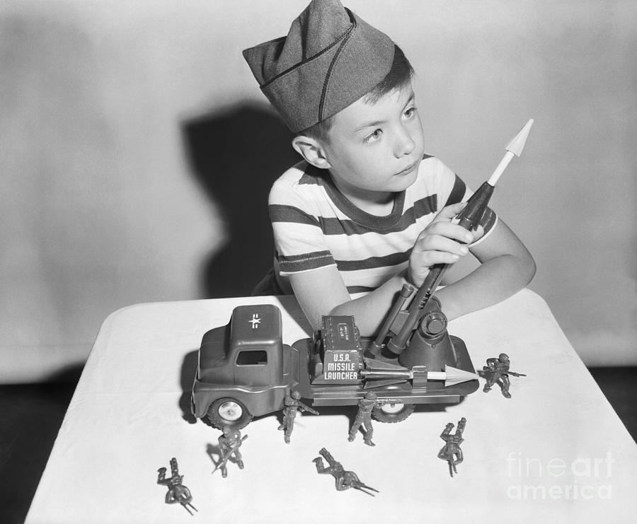Boy Playing With Toy Missile Launcher Photograph by Bettmann